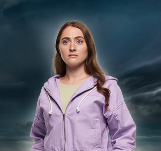 Image of a woman on a sky background with a worried expression.